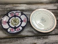 Both plates side by side on wooden surface