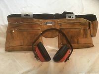 Front view of suede tool belt and earmuffs
