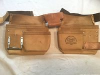 Front view of full leather tool belt showing both pouches and waist strap