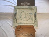 Tray, Fromages plaque behind, La Toilette plaque in front