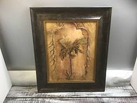 Full view of framed palm tree wall art