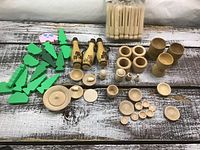 Full layout of all wooden pieces on table