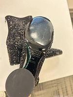 view of soles showing light wear and maker markings