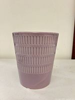 Front view of lavender ribbed ceramic planter