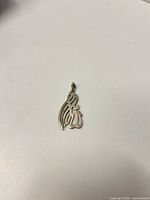 Front view of silver-plated script pendant