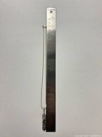 Full necklace beside 12 in ruler showing 24 in chain length