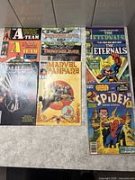 All nine comics laid out