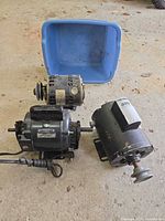 All three motors and blue tote for scale