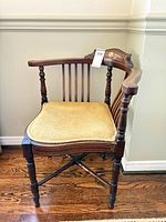 Full view of Edwardian corner chair showing overall design and fabric seat