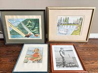 Group shot of four framed artworks