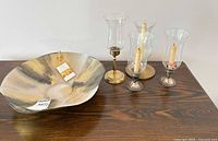 Lot overview showing bowl and four hurricane candle holders