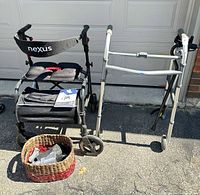 Overall view showing rollator, walker, cane, basket with braces