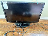 Front view of Samsung 2333HD monitor with power cord