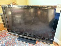 Front view of Sony Bravia TV with stand
