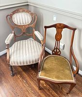 Both armchairs side by side showing overall design and size difference