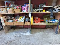 Shelf with Delta jig, bench vise, electrical parts boxes