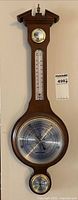 Full view of 28-inch Jason Empire banjo barometer mounted on wall