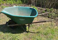 Full view left side Yardworks wheelbarrow on grass