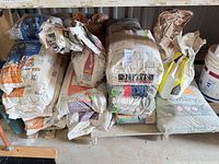 Stack of mixed cement and mortar bags on pallet