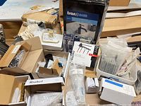 Overall lot showing faucet kit, Riobel boxes, assorted hardware