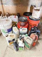 Group shot of all buckets and jugs on floor