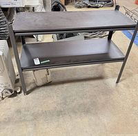 Front view of two-tier metal frame shelving unit