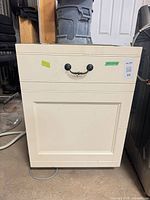 Front view showing cabinet panel door on dishwasher