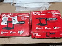 Two Milwaukee Packout 2-Shelf Racking Kit boxes, fronts visible