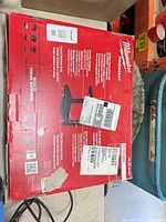 Front of sealed Milwaukee Packout Racking Kit box showing compatibility and unused condition