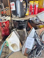 Group view of kettle, coffee maker, two irons