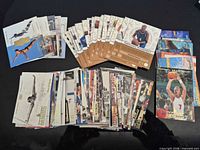 Full spread showing three stacked groups of the 1996 Upper Deck USA Olympicard cards