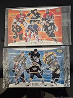 Front view of both sealed jumbo rookie promo cards