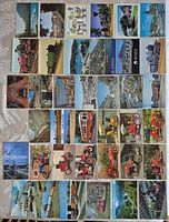 All 36 postcards laid out front side visible