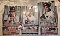Fronts of three oversized Donruss Studio cards (Chipper Jones, Mike Piazza, Frank Thomas) with a standard card for scale