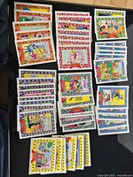 Top-down view of all 47 Archie Comics cards arranged in groups