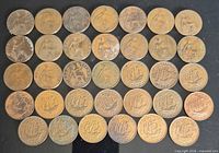 All 34 coins reverse sides showing Britannia and Golden Hind designs