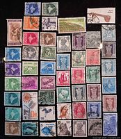 Grid view showing all 50 India postage stamps with various designs and postmarks