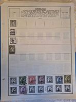 First album page with initial group of Yugoslavia stamps