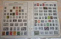 Both album pages side by side displaying all stamps