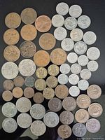 Full layout of 63 pre-decimal British coins showing both bronze and nickel issues