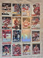 All sixteen Steve Yzerman hockey cards laid out in four by four grid