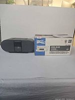 Denon boxed recorder alongside Sony boombox full view