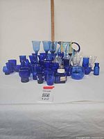 overview of all blue glass pieces on table