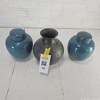 Front view of all three vases