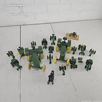 Group layout of all tractor models and figures on tabletop