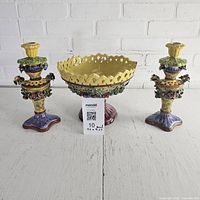 full set: pedestal bowl flanked by two candlesticks