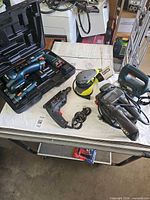 Group shot of all five power tools on work surface