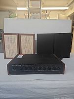 Front view showing both pairs of speakers and SAE Two EQ10 equalizer