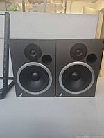 Front view of both Event 20/20 monitors