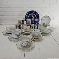 Overall view of all china pieces grouped on table